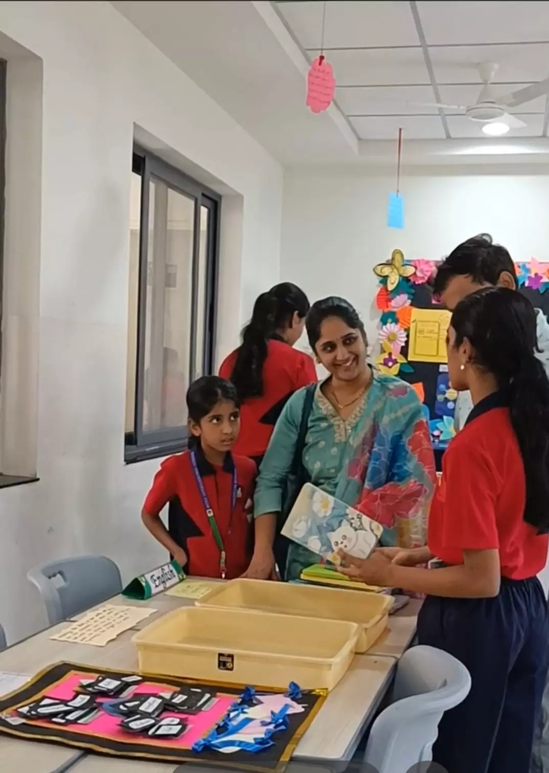 Meru students confidently sharing their work in a reflective learning setting.